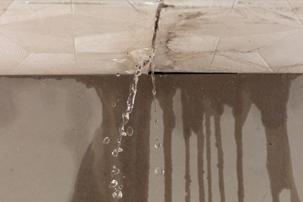 Professional Water Damage Restoration technician working in West Nottingham, NH